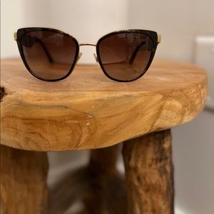 Dolce & Gabbana | DG2107. Gorgeous cat eye sunglasses.